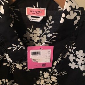 Kate Spade blk& white cotton top. Pleated tucks under breast. Nice for spring.